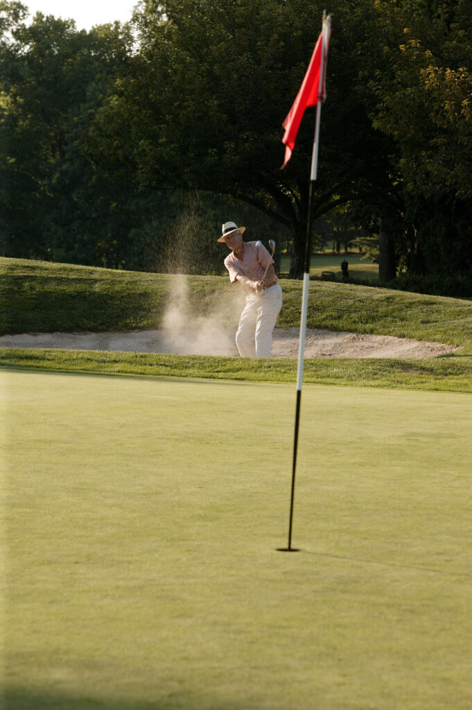 Man chipping out of a bunker